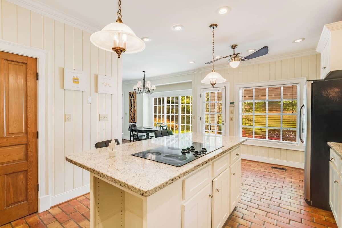Our modern kitchen with stainless steel appliances and ample counter space is perfect for cooking delicious meals.