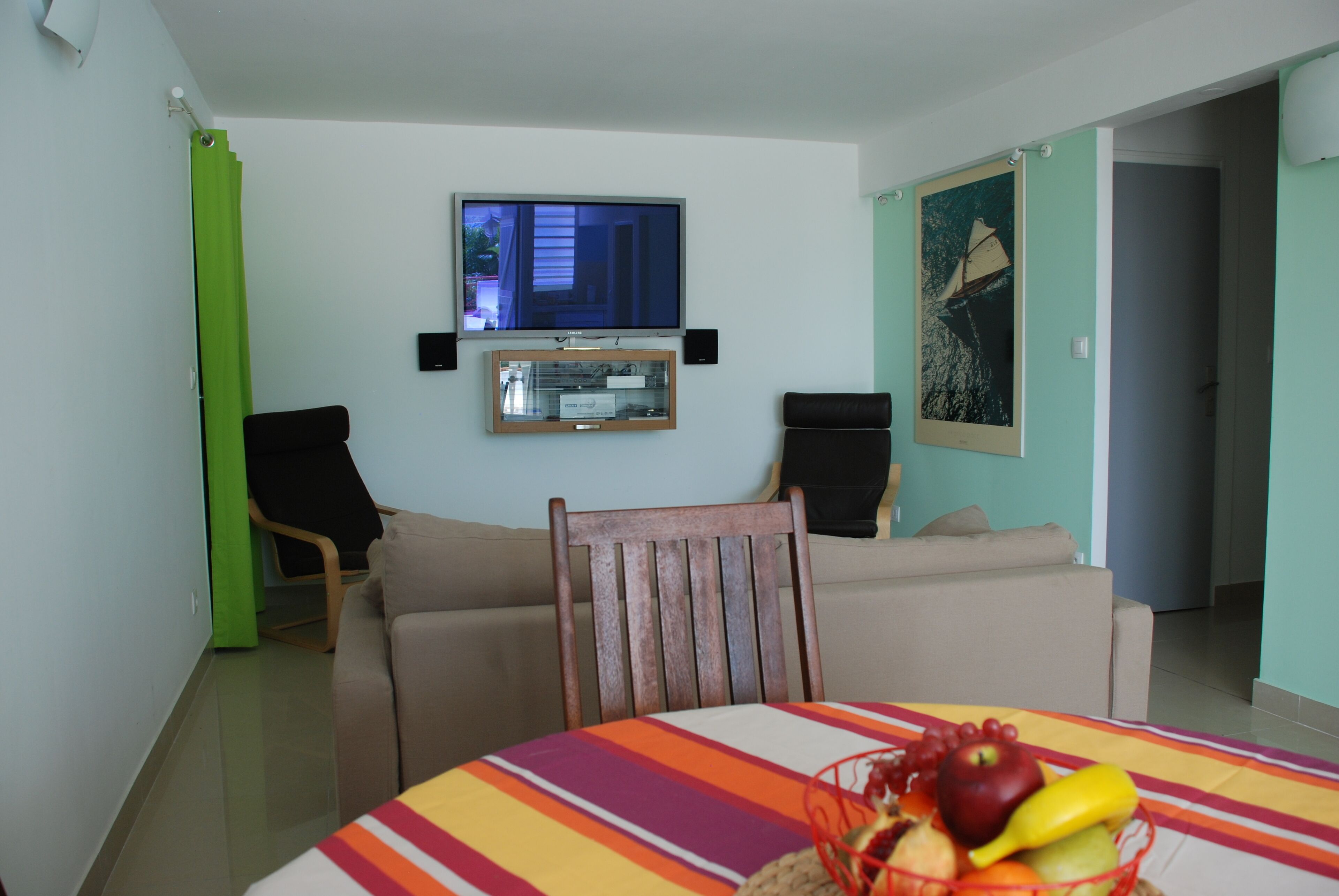 TV, DVD player, foosball, books