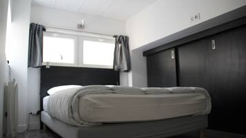 1 bedroom, desk, iron/ironing board, travel cot