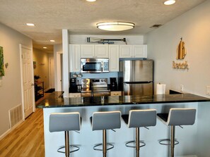 Fridge, microwave, oven, stovetop - Beach Condo-Bay Bliss (Garfield Township)