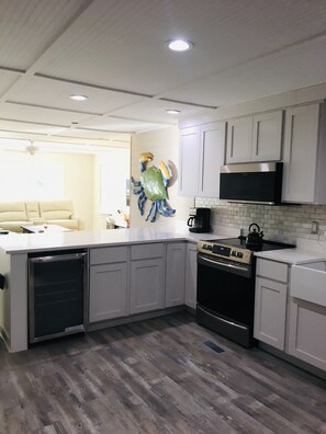 Fridge, microwave, dishwasher, coffee/tea maker