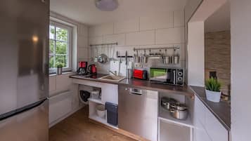 Bungalow (big - incl. cleaning fee 40 EUR) | Private kitchen | Fridge
