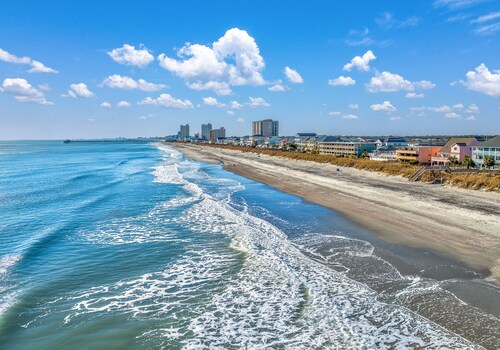 Affordable cozy 2 bedroom condo 1st floor screened in patio in gated community.