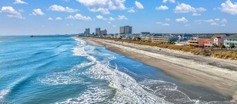 Affordable cozy 2 bedroom condo 1st floor screened in patio in gated community.