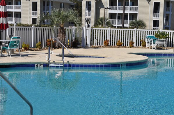 Outdoor pool - Affordable cozy 2 bedroom condo 1st floor screened in patio in gated community. (North Myrtle Beach)