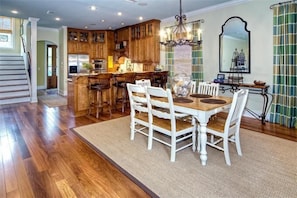 Enjoy meals at the central island breakfast bar in this well-appointed kitchen and dining area.