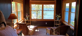 Sandy Beach Lakefront Near Crystal Mountain with Kayaks and Pedal Boat