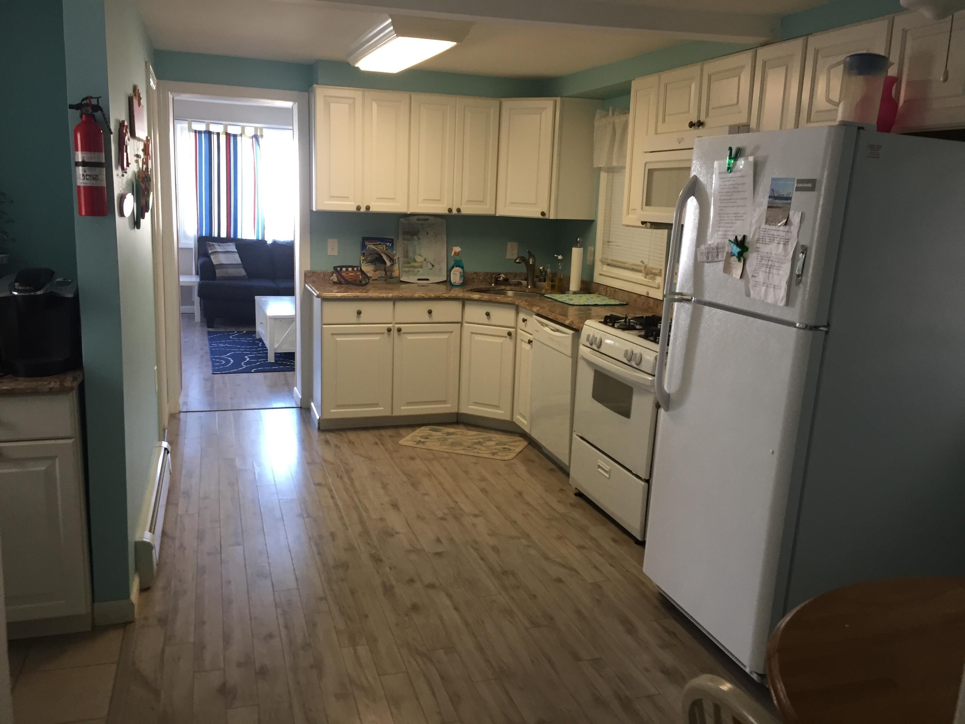 Spacious kitchen with beautiful Italian granite counter tops with dinette