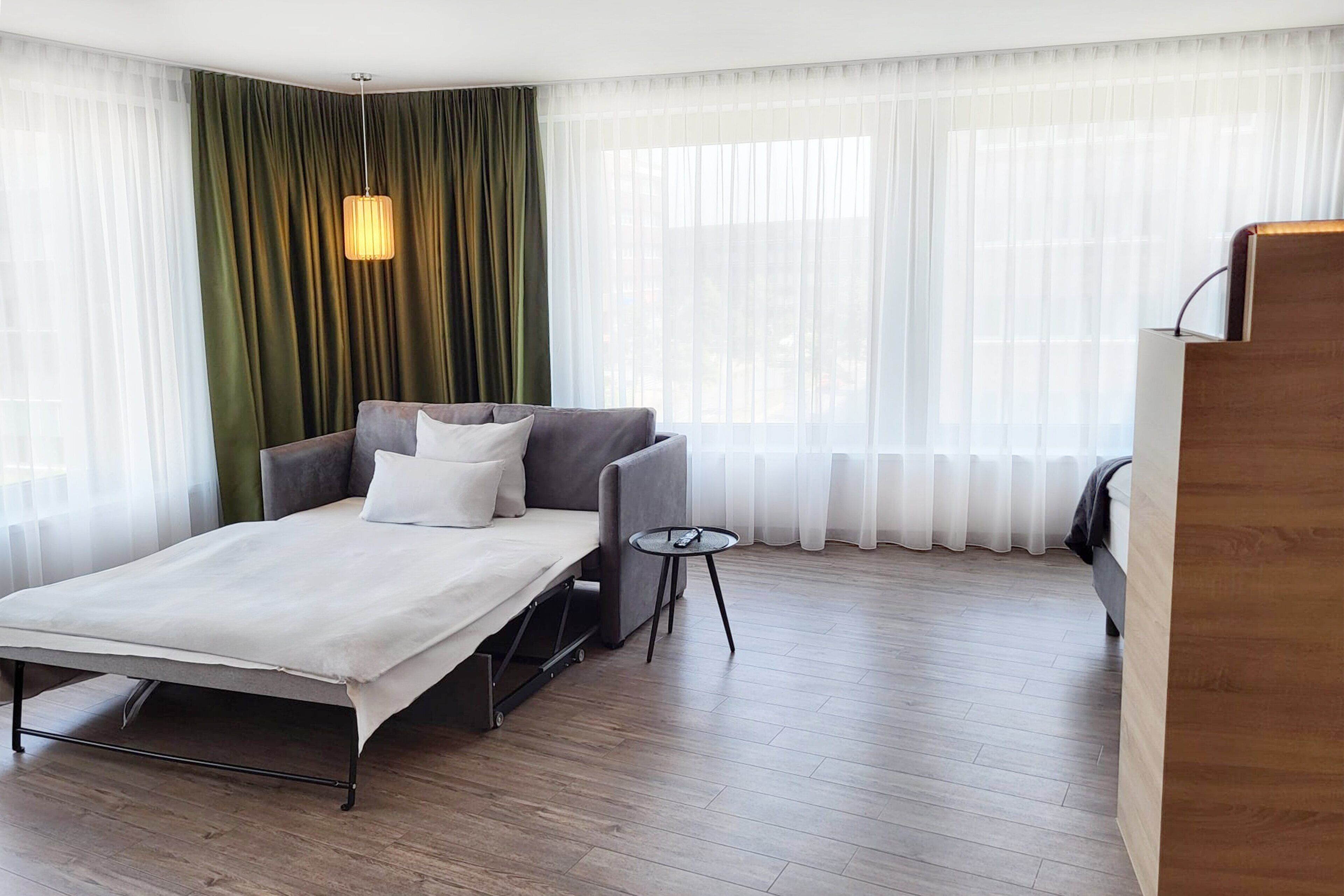 Premium Room, 1 Queen Bed with Sofa bed, Kitchenette (Family Room) | 1 bedroom, hypo-allergenic bedding, in-room safe, blackout curtains