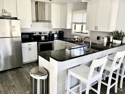 DISCOUNTED!! PARTIAL OCEANFRONT .1 MIN WALK TO BEACH-boardwalk Hottub and Pool