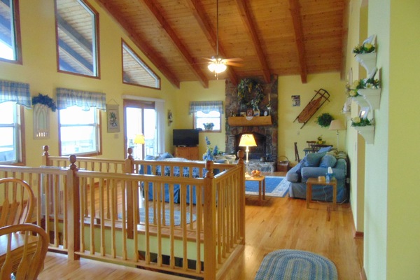 Living Room and stairwell going down stairs.