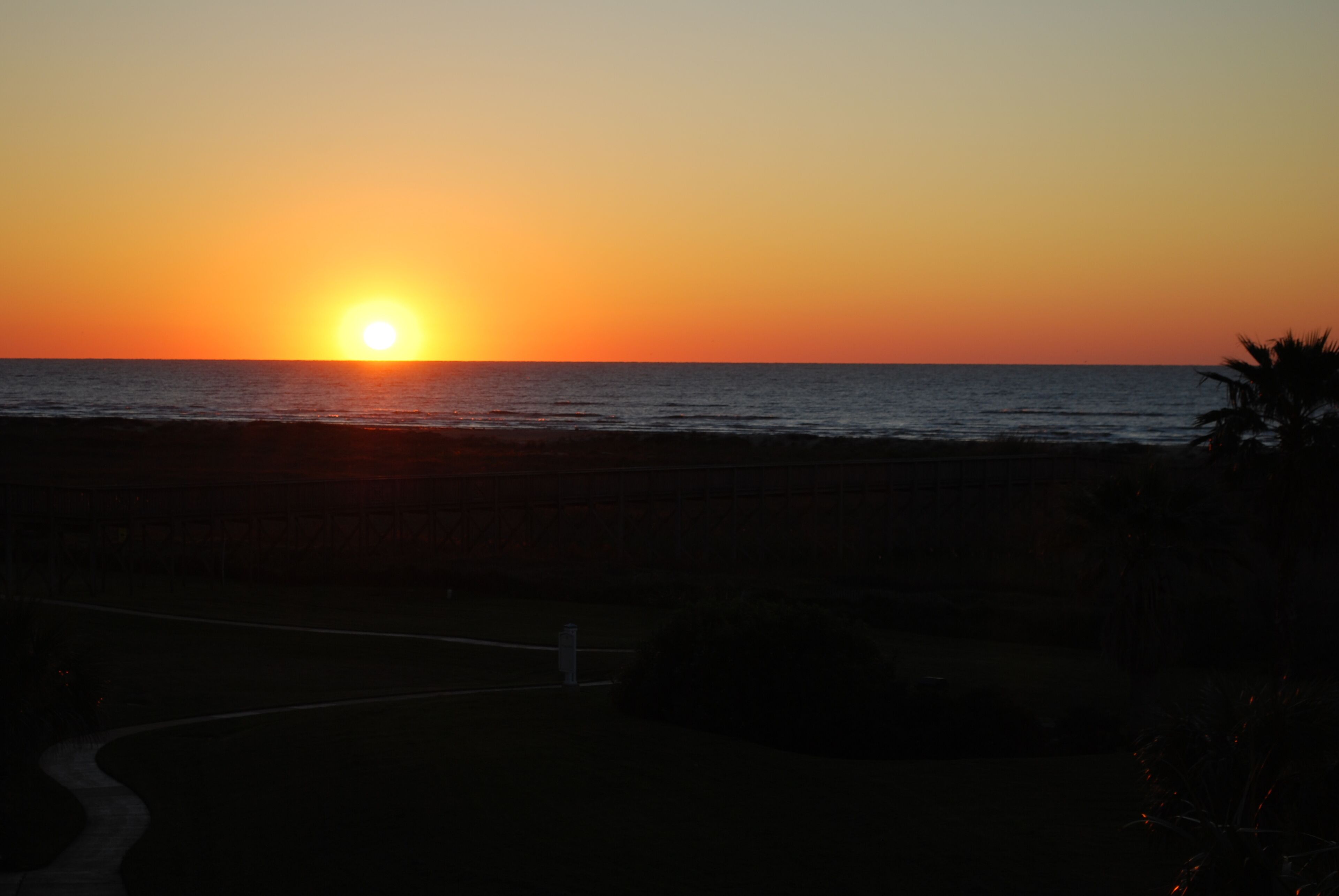 Sunrise over the Gulf of Mexico can be viewed from your private large balcony.