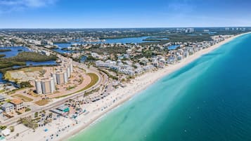 On the beach, sun loungers, beach towels