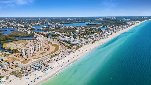 On the beach, sun-loungers, beach towels