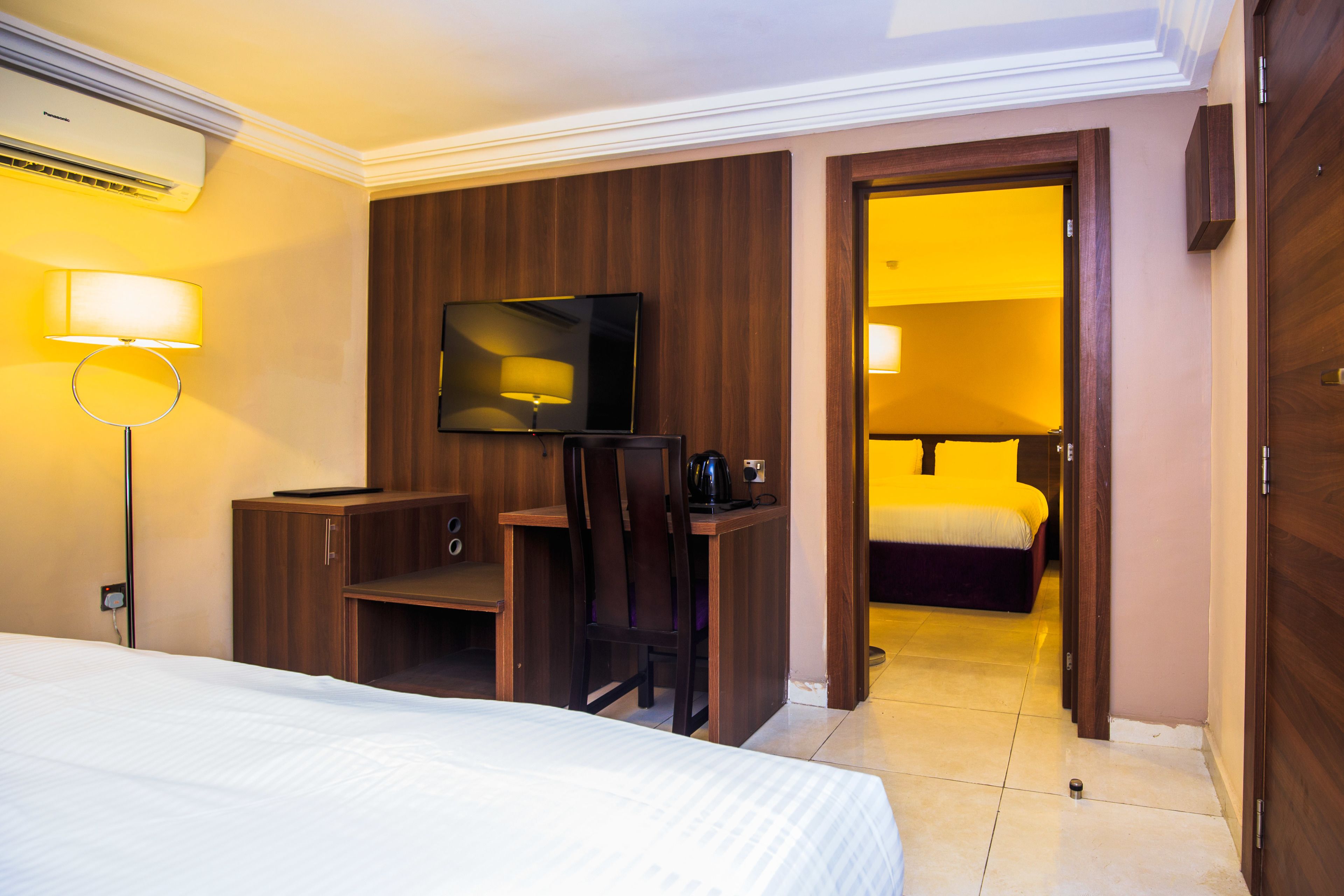 connecting room | 1 bedroom, free minibar items, in-room safe, individually decorated