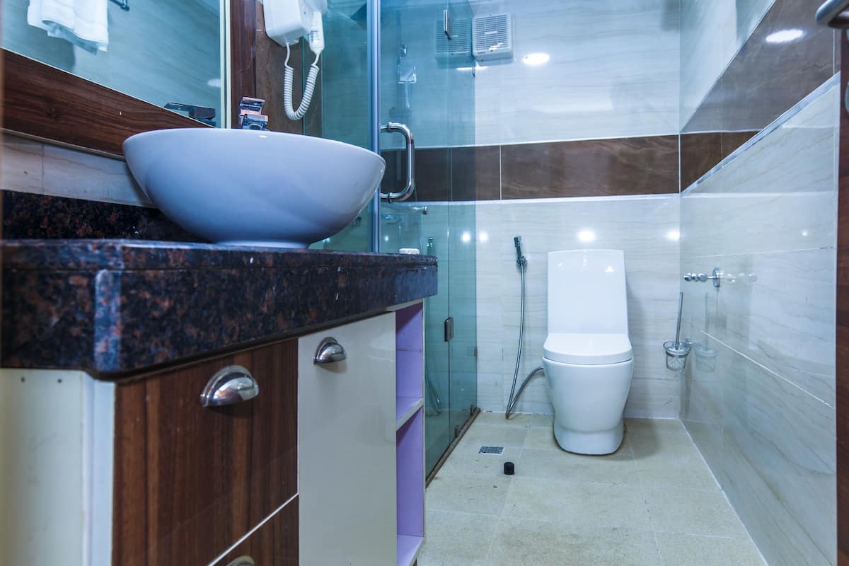 shower, rainfall showerhead, hair dryer, slippers