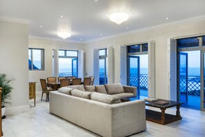 Deluxe Villa, 6 Bedrooms, Private Pool | Living area | Flat-screen TV - Castle Rock Villa (Cape Town)