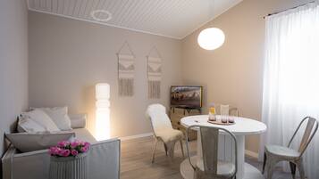 Family Apartment, 2 Bedrooms | Living area | Flat-screen TV