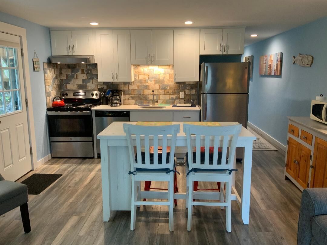 RECENTLY RENOVATED 2 BEDROOM CONDO WITH DECK & OFF STREET PARKING CLOSE TO BEACH