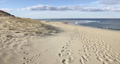 RECENTLY RENOVATED 2 BEDROOM CONDO WITH DECK & OFF STREET PARKING CLOSE TO BEACH