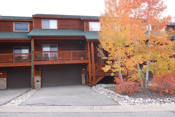 Three level townhome, two car heated garage  secure ski, board bike storage.