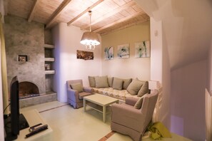 House, 2 Bedrooms, Sea View | Living room | Flat-screen TV - Avra House (Mykonos)