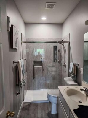 Combined shower/tub, hair dryer, towels, soap