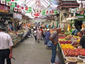 Explore a vibrant market with a variety of fresh produce on offer.
