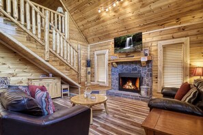 Flat-screen TV, fireplace, video games, DVD player