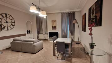 Apartment, 2 Bedrooms | Living area | Flat-screen TV