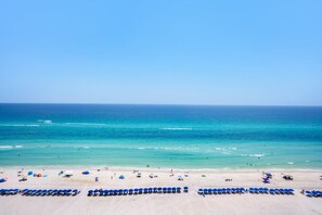 On the beach, sun loungers