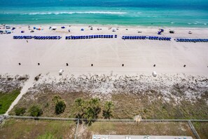 On the beach, sun loungers