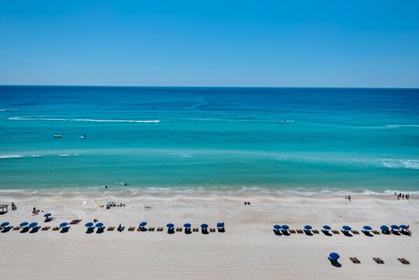 On the beach, sun loungers