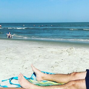 On the beach, sun-loungers, beach towels