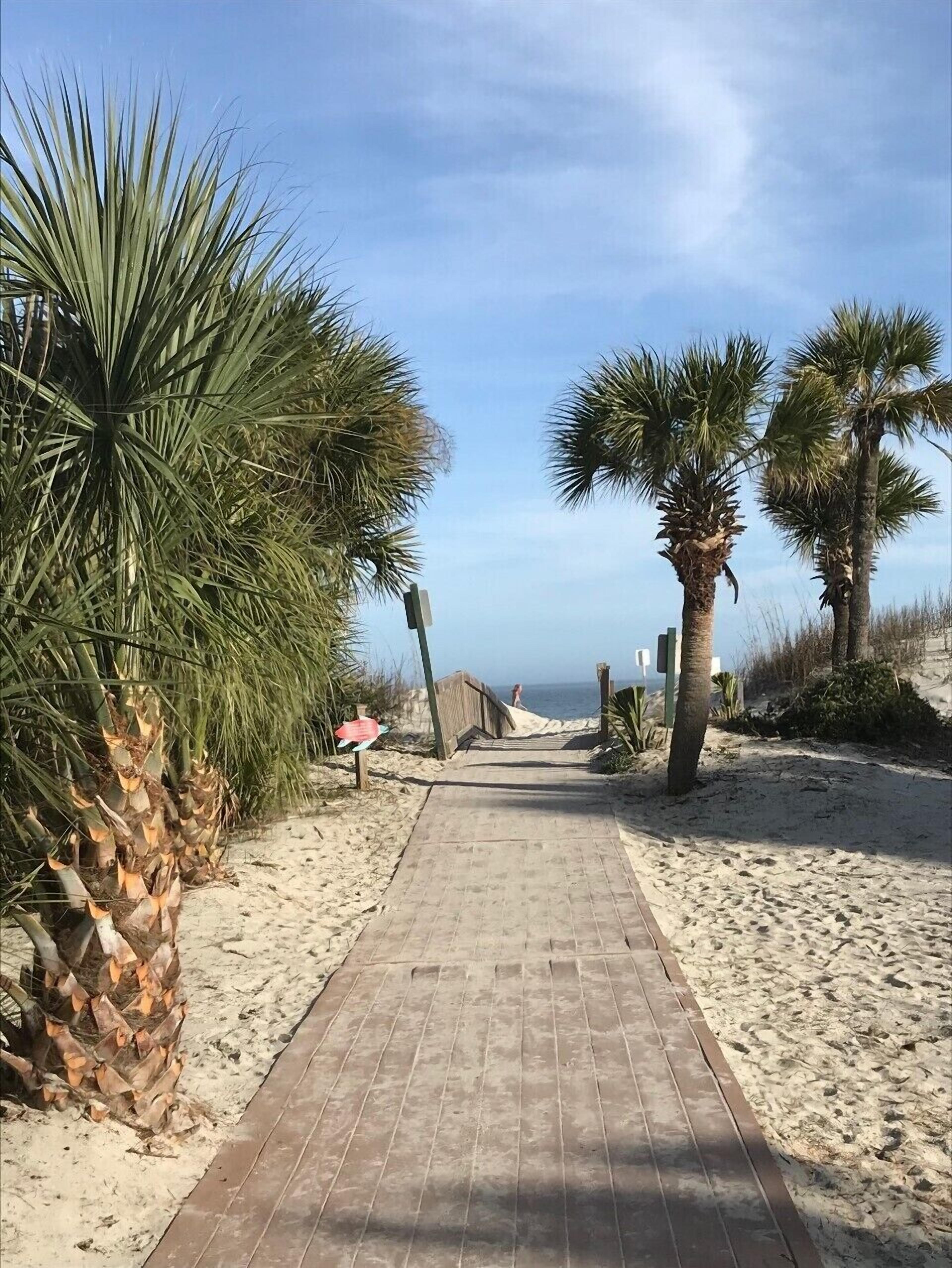 On the beach, sun loungers, beach towels