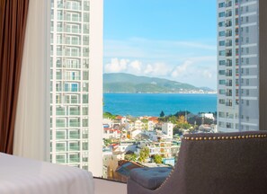 Deluxe Room, Sea View | Minibar, in-room safe, desk, blackout drapes - Areca Hotel Nha Trang (Nha Trang)