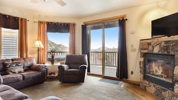 Condo, 2 Bedrooms | Living area | Flat-screen TV, fireplace