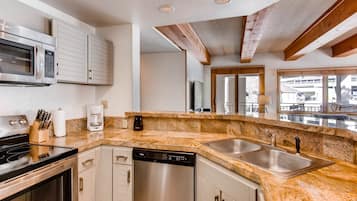 Condo, 2 Bedrooms | Private kitchen | Oven, coffee/tea maker