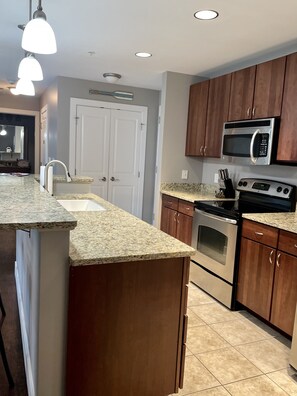 Fridge, microwave, oven, stovetop - Updated Condo Near Beaches, Downtown, Restaurants, and Shops (Grand Haven)