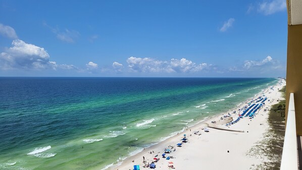 On the beach, sun-loungers