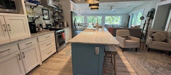 Waterfront beauty with dock and fireplace! Check in Bay! New Hot Tub!!
