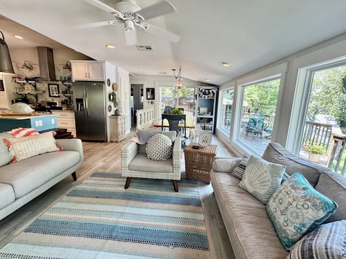 Waterfront beauty with dock and fireplace! Check in Bay! New Hot Tub!!