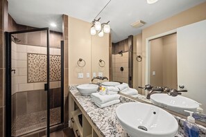 Bathtub, hair dryer, towels