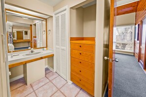 Combined shower/tub, hair dryer, towels, soap