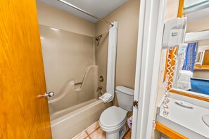 Combined shower/tub, hair dryer, towels, soap