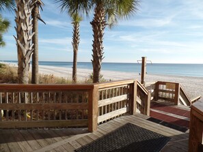 On the beach, sun-loungers