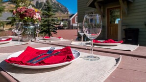 A table set for two with wine glasses, plates, and cutlery. - Winter Chalet, pet friendly, shuttle!
Leaves are changing!
Discounted rates! (Crested Butte)