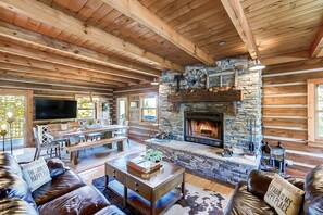 Smart TV, fireplace, video games, DVD player - Horse Ranch Log Home w/ Hot Tub & Lake! (Loveland)