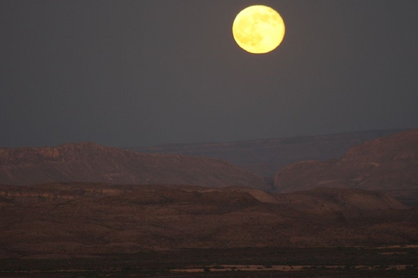 moon rise over tarantula ranch,texas