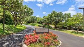 A sign indicating Waiakea Ekolo Village with directions to buildings and restaurants. - WAILEA JEWEL; NEAR BEACHES; SHOPS/5 STAR HOTELS; CONVENIENT! (Kihei)